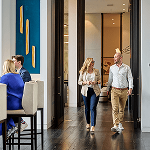 couple walking through office in Canary wharf
