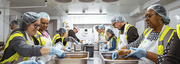 Volunteers working in kitchen